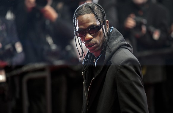 Travis Scott poses for photographers upon arrival at the premiere of 'The Idol' television series at the 76th International Film Festival, Cannes, South of France, Monday, May 22, 2023. ...
