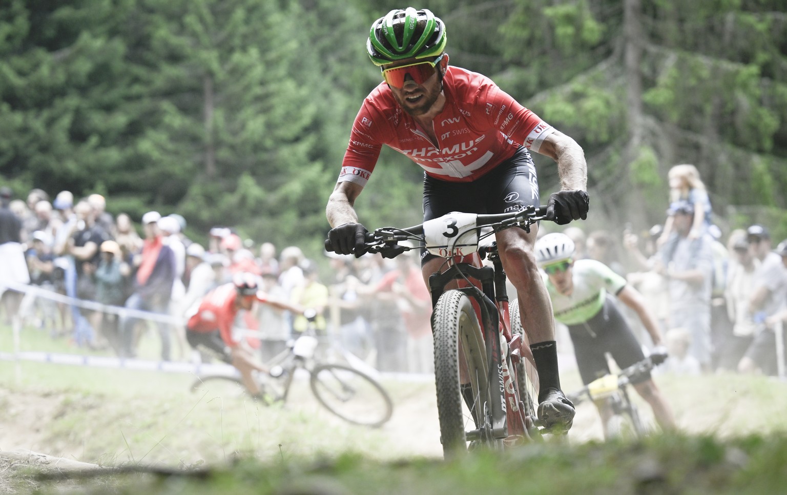 Mathias Flueckiger of Switzerland in action during the UCI Cross Country Mountain Bike race, on Sunday, July 10, 2022, in Lenzerheide, Switzerland. (KEYSTONE/Gian Ehrenzeller)
