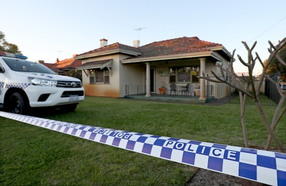 epa07007705 Police are seen outside a property in Coode Street, Bedford, Perth, Western Australia, Australia, 09 September 2018. Five bodies have been discovered at a home in suburban Perth with homic ...
