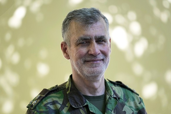 Rear Admiral Henrique Gouveia e Melo poses for a portrait outside a vaccination center in Lisbon, Tuesday, Sept. 21, 2021. As Portugal nears its goal of fully vaccinating 85% of the population against ...