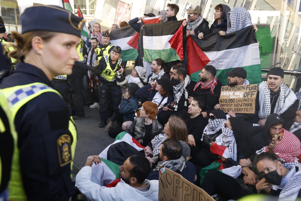 epa11333617 People take part in a demonstration in support of the Palestinian people and against Israel's participation in the 68th Eurovision Song Contest (ESC) held at Hyllie outside Malmo Aren ...