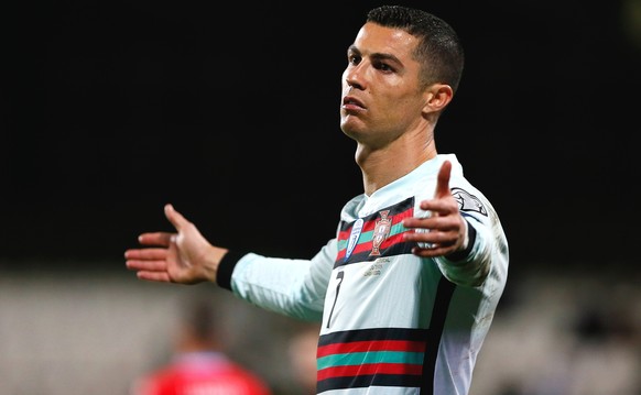 epa09107533 Portugal's Cristiano Ronaldo reacts during the FIFA World Cup 2022 qualifying soccer match between Luxembourg and Portugal in Luxembourg, 30 March 2021. EPA/Julien Warnand