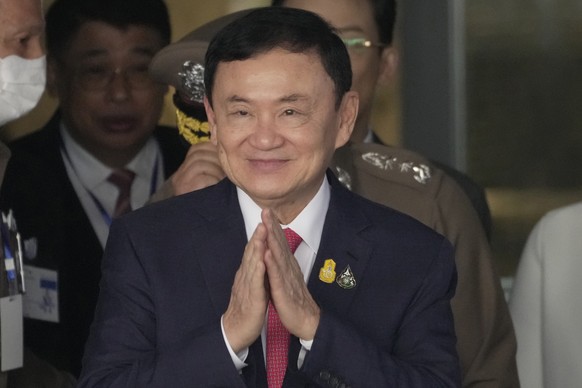 FILE - Thailand&#039;s former Prime Minister Thaksin Shinawatra arrives at Don Muang airport in Bangkok, Thailand, Aug. 22, 2023. Thai prosecutors said Thaksin was formally indicted Tuesday, June 18,  ...