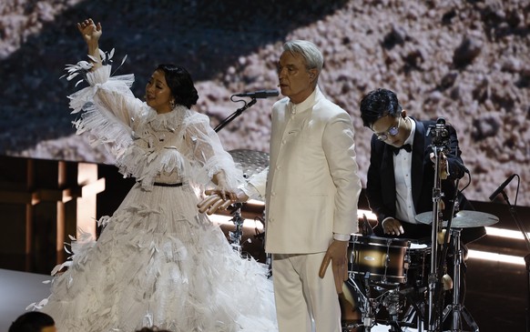 epa10518642 David Byrne and Stephanie Hsu performs during the 95th annual Academy Awards ceremony at the Dolby Theatre in Hollywood, Los Angeles, California, USA, 12 March 2023. The Oscars are present ...