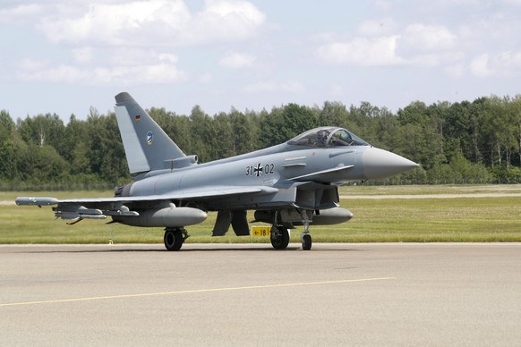 epa11357961 A German Air Force Eurofighter Typhoon is seen during &#039;Tango Scramble&#039; due to German Defence Minister Boris Pistorius&#039; visit to Lievarde airbase in Latvia, 21 May 2024. Bori ...