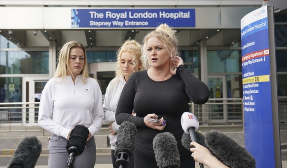 The mother of Archie Battersbee, Hollie Dance (right), speaks to the media outside the Royal London hospital in Whitechapel, east London, Wednesday Aug. 3, 2022. Archie Battersbee, 12, was found uncon ...
