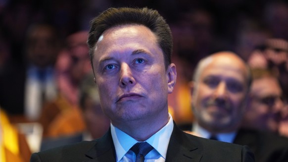 FILE - Elon Musk attends the Saudi Investment Forum at the Kennedy Center, Wednesday, Nov. 19, 2025, in Washington. (AP Photo/Evan Vucci, File)