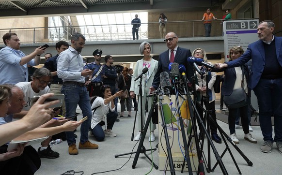 Lumumba&#039;s lawyer Carlo Pacelli speaks with reporters after the hearing at the Florence courtroom in Florence, Italy, Wednesday, June 5, 2024. Amanda Knox returns to an Italian courtroom Wednesday ...