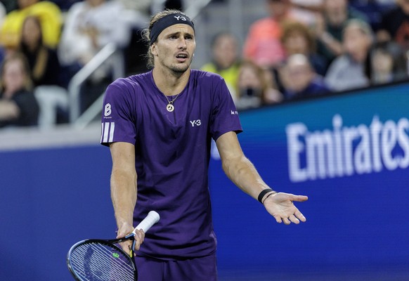 epa12338782 Alexander Zverev of Germany gestures during his match against Felix Auger Aliassime of Canada during the third round of the US Open Tennis Championships at the USTA Billie Jean King Nation ...