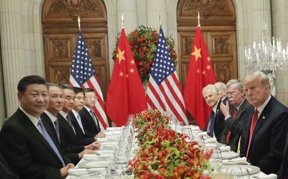 President Donald Trump with China&#039;s President Xi Jinping and members of their official delegations during their bilateral meeting at the G20 Summit, Saturday, Dec. 1, 2018 in Buenos Aires, Argent ...