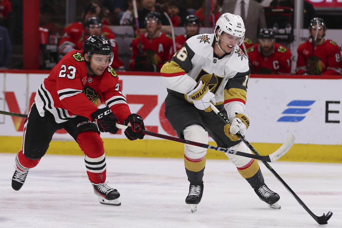Vegas Golden Knights left wing Pavel Dorofeyev (16) controls the puck against Chicago Blackhawks center Philipp Kurashev (23) during the second period of an NHL hockey game Friday, March 28, 2025, in  ...