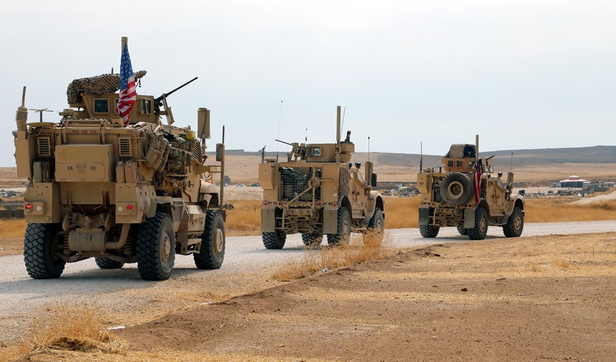 epa07936944 A convoy of US troops head toward the Iraqi borders in northeastern of Syria, 20 October 2019. Media reported the US troops started their withdrawal from north Syria towards Iraq according ...