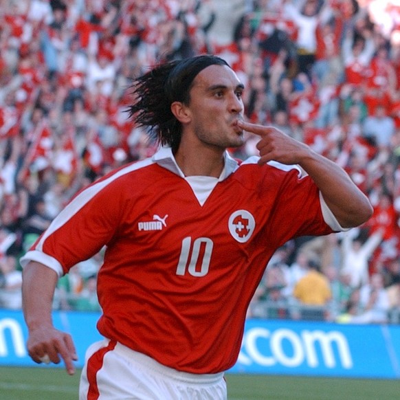 Swiss Hakan Yakin celebrates his goal for 1:0 during the EURO 2004 qualifyer between Switzerland and Ireland, at St. Jakob Park in Basel, Switzerland, Saturday, October 11, 2003. (KEYSTONE/Walter Bier ...