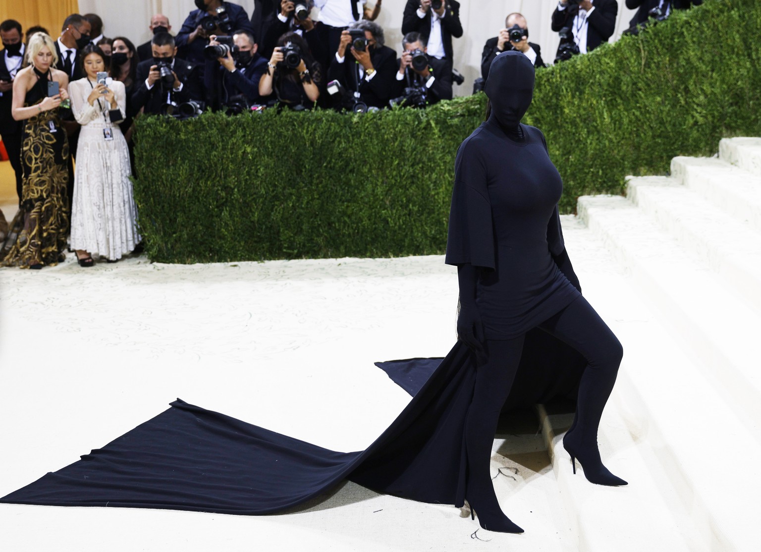 epa09466890 Kim Kardashian poses on the red carpet for the 2021 Met Gala, the annual benefit for the Metropolitan Museum of Art&#039;s Costume Institute, in New York, New York, USA, 13 September 2021. ...