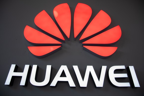 epa07586409 A view shows a Huawei logo next to a Huawei store in a shopping mall in Beijing, China, 20 May 2019. According to media reports on 20 May 2019, the US based multinational technology compan ...