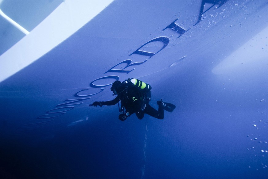 epa09680240 (FILE) - A handout photo made available by the Press Office of the Italian Carabinieri Police Divers' unit on 19 January 2012 shows scuba divers of the 'Gruppo Carabinieri Subaqu ...