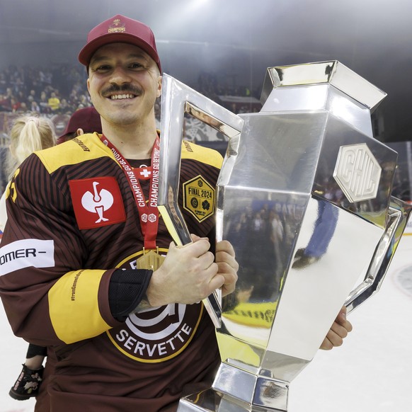 Geneve-Servette&#039;s Alessio Bertaggia celebrates with the trophy after the Champions Hockey League Final game between Switzerland&#039;s Geneve-Servette HC and Sweden&#039;s Skelleftea AIK, at the  ...