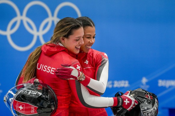 Melanie Hasler and Nadja Pasternack, of Switzerland, celebrate after the women&#039;s bobsleigh heat 4 at the 2022 Winter Olympics, Saturday, Feb. 19, 2022, in the Yanqing district of Beijing. (AP Pho ...