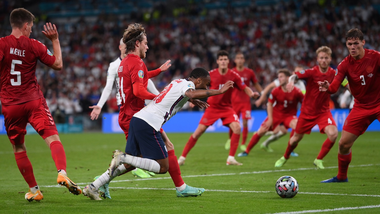 epa09330321 Raheem Sterling (C) of England is fouled in the penalty box during the UEFA EURO 2020 semi final between England and Denmark in London, Britain, 07 July 2021. EPA/Laurence Griffiths / POOL ...