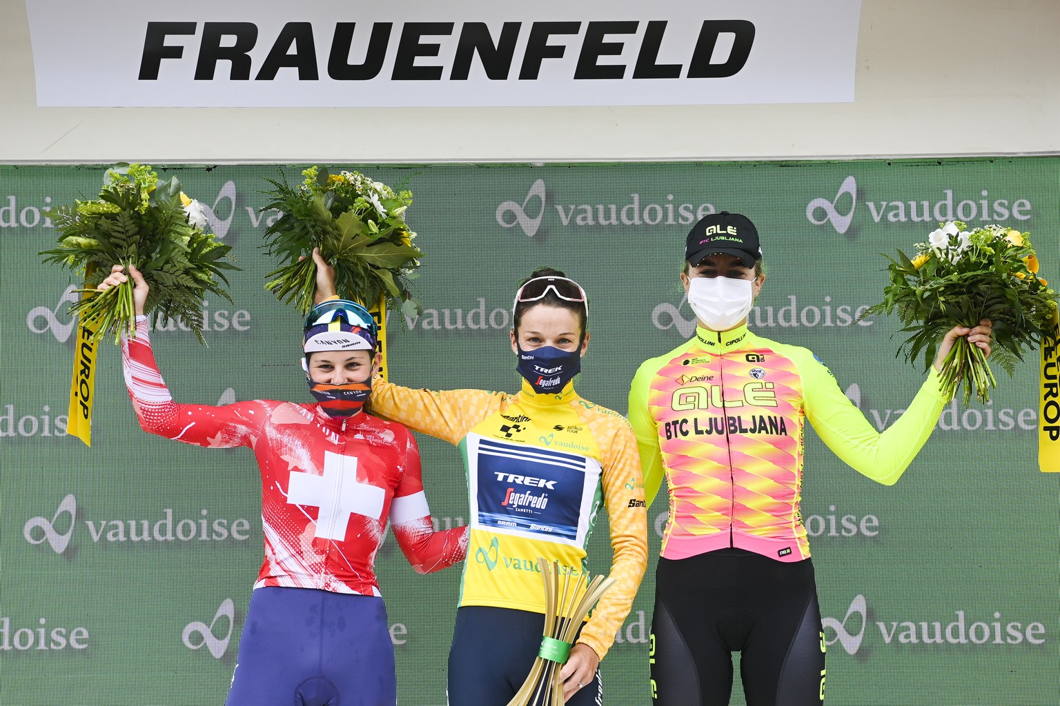 epa09250577 The overall podium with (L-R) second-placed Elise Chabbey from Switzerland of Canyon Sram Racing, winner Elizabeth Deignan from Great Britain of Trek-Segafredo, and third placed Marlen Reu ...