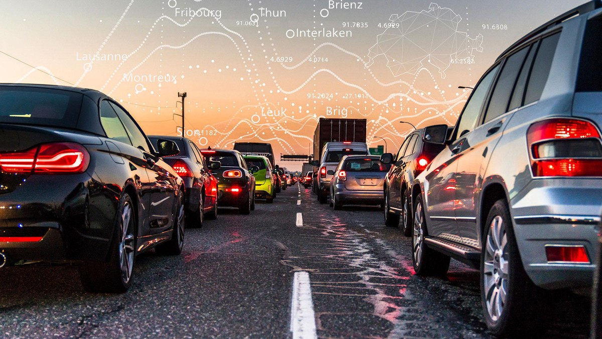 Vancouver, British Columbia - Canada. Traffic jam on a busy highway at rush hour. Cars in line, bumper to bumper, stuck in traffic at dusk on a clear sky night.