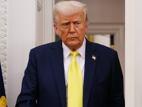 epa12039620 US President Donald Trump arrives for the swearing in ceremony of Mehmet Oz as Administrator of the Centers for Medicare and Medicaid Services in the Oval Office at the White House in Wash ...