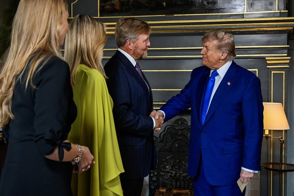epa12195578 Dutch King Willem-Alexander and Queen Maxima, together with Crown Princess Amalia, greet US President Donald Trump at Paleis Huis Ten Bosch, prior to a dinner with participating heads of s ...