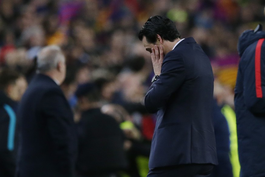 PSG head coach Unai Emery reacts at the end of the Champions League round of 16, second leg soccer match between FC Barcelona and Paris Saint Germain at the Camp Nou stadium in Barcelona, Spain, Wedne ...