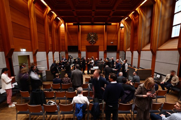 epa12452429 A courtroom is seen prior to the main hearing in the criminal case against Rene Benko for fraudulent bankruptcy at the Innsbruck Regional Court in Innsbruck, Austria, 14 October 2025. The  ...