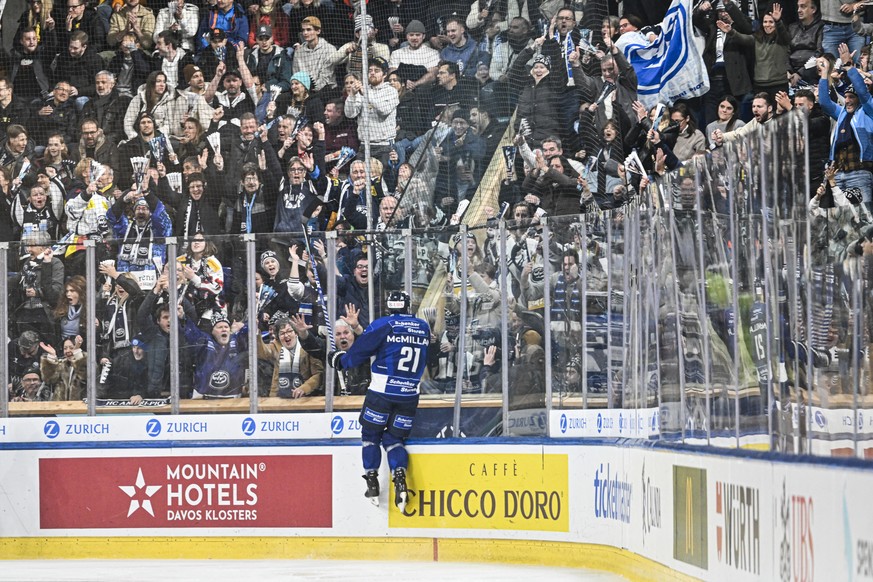 Ambri&#039;s Brandon McMillan reacts after scoring 1-0 during the game between Switzerland&#039;s HC Ambri-Piotta and HC Davos, at the 94th Spengler Cup ice hockey tournament in Davos, Switzerland, Fr ...