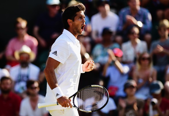 LONDON, ENGLAND - JULY 01: Fernando Verdasco of Spain celebrates winning in his Gentlemens Singles Second Round match against Dominic Thiem of Austria during day three of the Wimbledon Lawn Tennis Cha ...