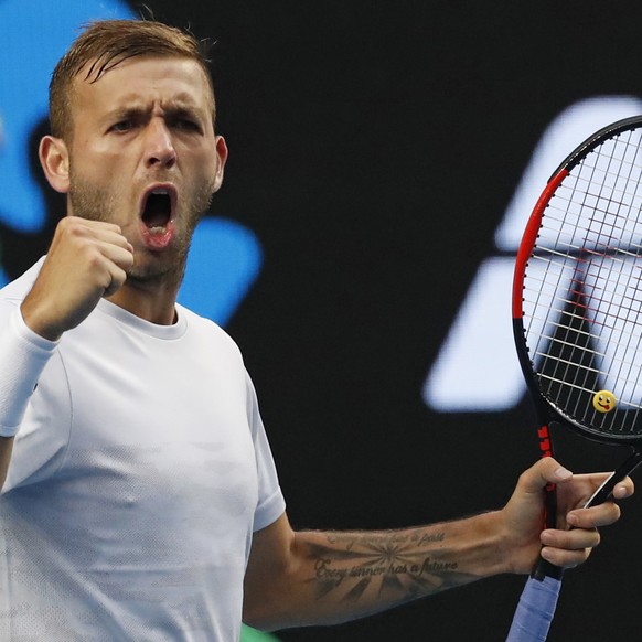 Britain&#039;s Daniel Evans celebrates a point win over Australia&#039;s Bernard Tomic during their third round match at the Australian Open tennis championships in Melbourne, Australia, Friday, Jan.  ...