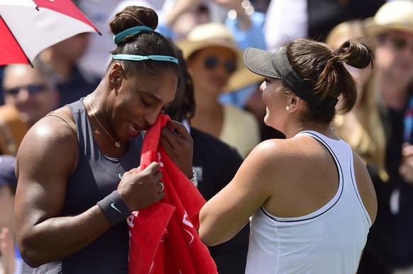 Canada&#039;s Bianca Andreescu, right, consoles Serena Williams, of the United States, after Williams had to retire from the final of the Rogers Cup tennis tournament in Toronto, Sunday, Aug. 11, 2019 ...