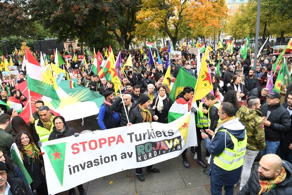 epa07915196 Kurds living in Sweden protest against the Turkish military operaion in northern Syria, in Stockholm, Sweden, 12 October 2019. Turkey has launched an offensive targeting Kurdish forces in  ...