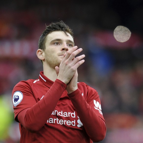 Liverpool&#039;s Andrew Robertson applauds to supporters before the English Premier League soccer match between Liverpool and Tottenham Hotspur at Anfield stadium in Liverpool, England, Sunday, March  ...
