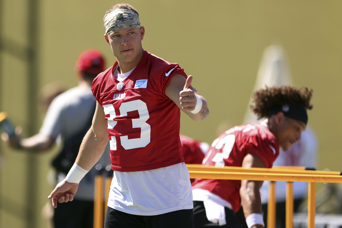 San Francisco 49ers' Christian McCaffrey gives fans a thumbs-up during NFL football training camp in Santa Clara, Calif., Wednesday, July 26, 2023. (Scott Strazzante/San Francisco Chronicle via A ...
