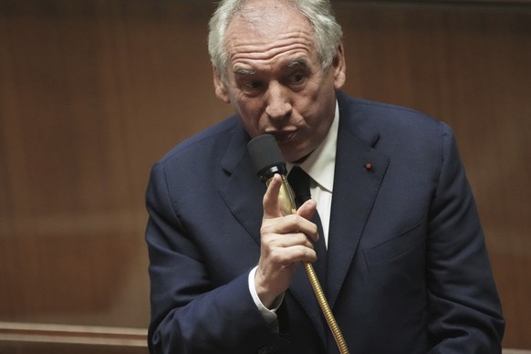 FILE - French Prime Minister Francois Bayrou addresses the National Assembly, prior to a parliamentary confidence vote that could bring him down, Monday, Sept. 8, 2025 in Paris. (AP Photo/Christophe E ...