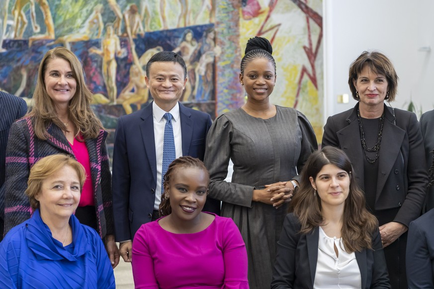 Jack Ma, center, Executive Chairman of the Alibaba Group and Melinda Gates, left, Co-Chair of the Bill &amp; Melinda Gates Foundation and everything on the right Doris Leuthard, former Swiss Federal C ...