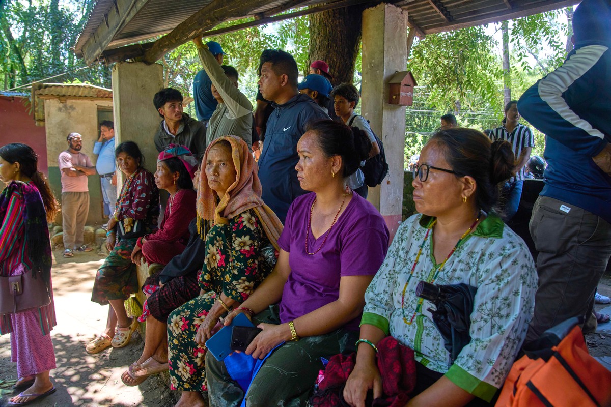 Residents wait for the news of their relatives missing after flash floods in Bidur, Nepal's Nuwakot district, Thursday, Aug. 27, 2026. (AP Photo/Niranjan Shrestha)
Nepal Flash Floods