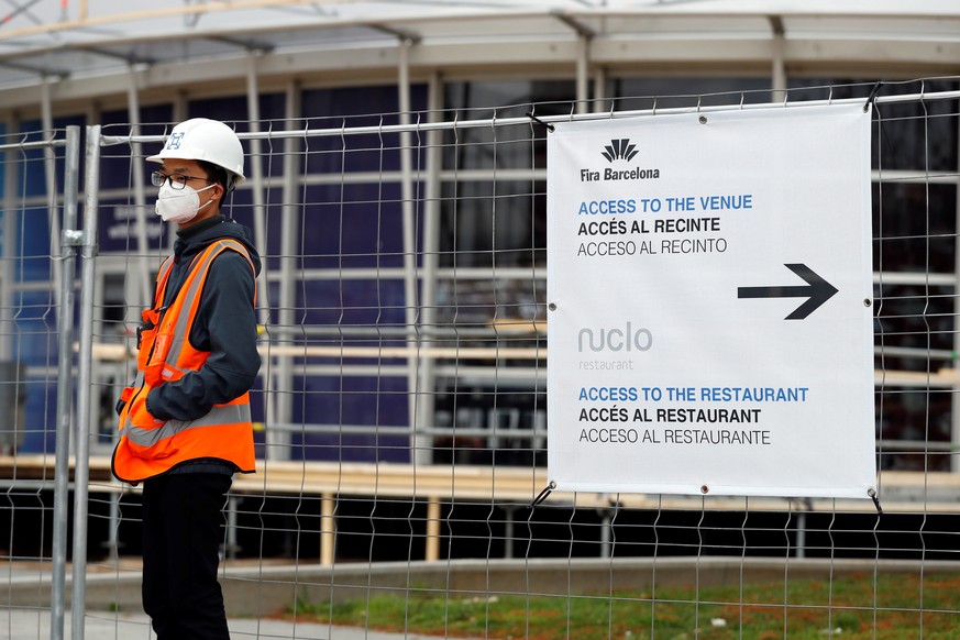 epa08212987 An operator at the entry of the Fira Barcelona Montjuic center in Barcelona, Catalonia, 12 February 2020, where the Mobile World Congress (MWC) is supposed to take place from 24 to 27 Febr ...