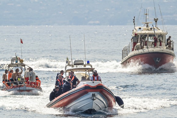 Italian firefighter divers work at the site of a shipwreck, in Porticello, Sicily, southern Italy, Thursday, Aug. 22, 2024. Divers searching the wreck of the superyacht Bayesian that sank off Sicily o ...