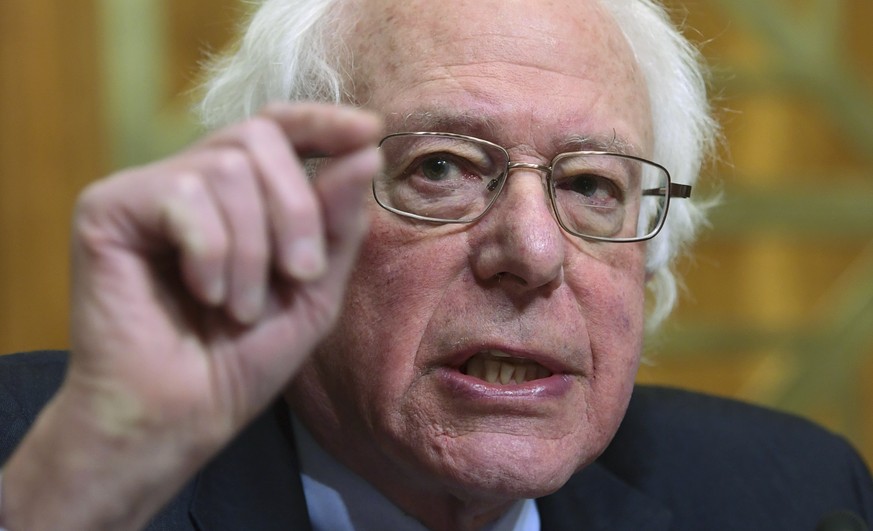 FILE - In this Tuesday, Feb. 13, 2018, file photo, Senate Banking Committee ranking member Sen. Bernie Sanders, I-Vt., asks a question while testifying before the Senate Budget Committee regarding Pre ...