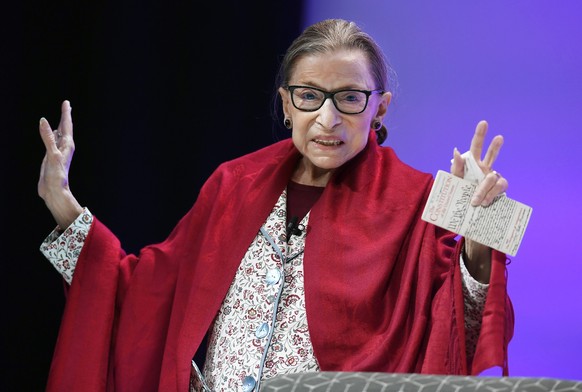 FILE - In this Oct. 3, 2019 file photo, U.S. Supreme Court Justice Ruth Bader Ginsburg gestures to students before she speaks at Amherst College in Amherst, Mass. In her last years on the Supreme Cour ...