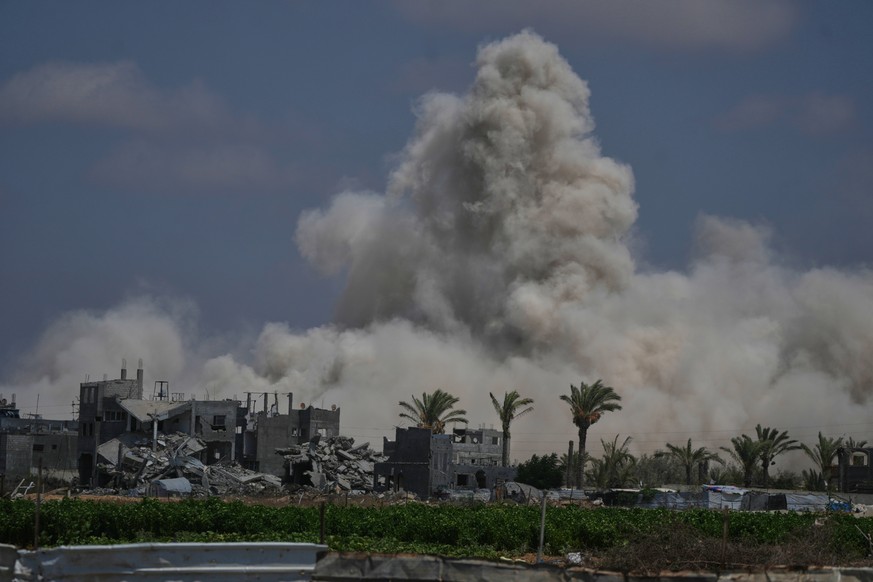 The Israeli army demolishes buildings east of Deir al-Balah, central Gaza Strip, Saturday Aug. 22, 2026. (AP Photo/Abdel Kareem Hana)
Israel Palestinians Gaza