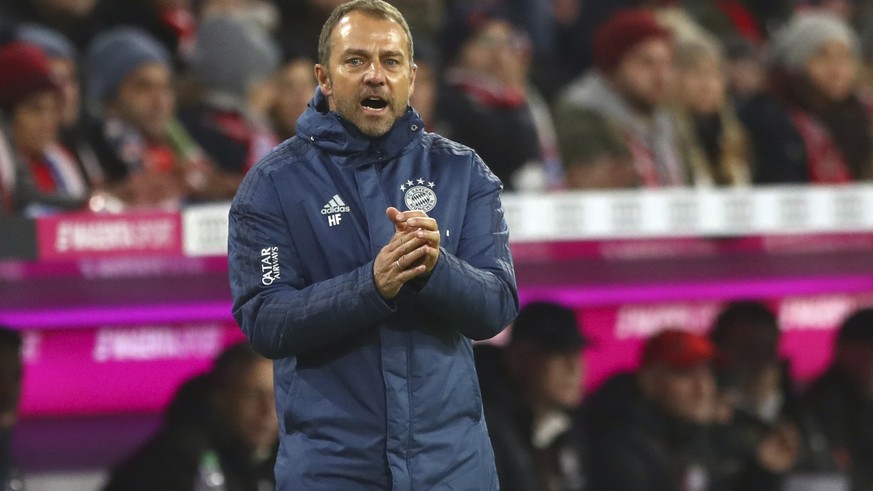 Bayern&#039;s interim coach Hansi Flick reacts during the German Bundesliga soccer match between FC Bayern Munich and Borussia Dortmund, in Munich, Germany, Saturday, Nov. 9, 2019. (AP Photo/Matthias  ...