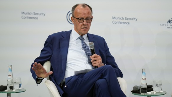 Chairman of the Christian Democratic Union Friedrich Merz participates in a panel discussion during the Munich Security Conference at the Bayerischer Hof Hotel in Munich, Germany, Saturday, Feb. 15, 2 ...