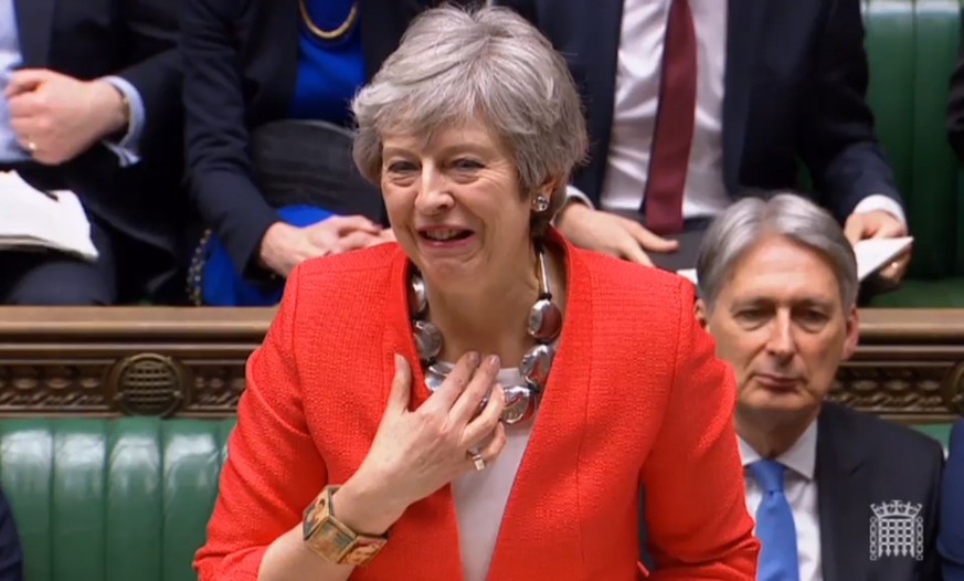 epa07431248 A grab from a handout video made available by the UK Parliamentary Recording Unit shows British Prime Minister Theresa May clears her throat as she begins her address during a debate at th ...