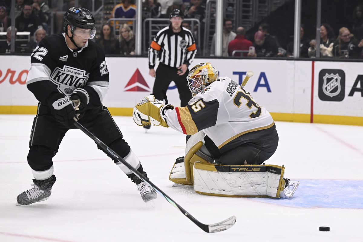 Los Angeles Kings left wing Kevin Fiala (22) skates to the puck with Vegas Golden Knights goaltender Ilya Samsonov (35) defending during the second period of an NHL hockey game in Los Angeles, Monday, ...