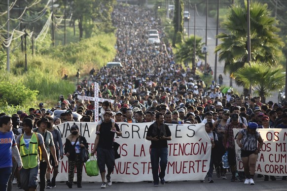 Migrants who had been waiting for temporary transit papers but failed to get them after waiting, some up to two months, leave Tapachula, Mexico, Monday, Oct. 30, 2023, as they make their way to the U. ...
