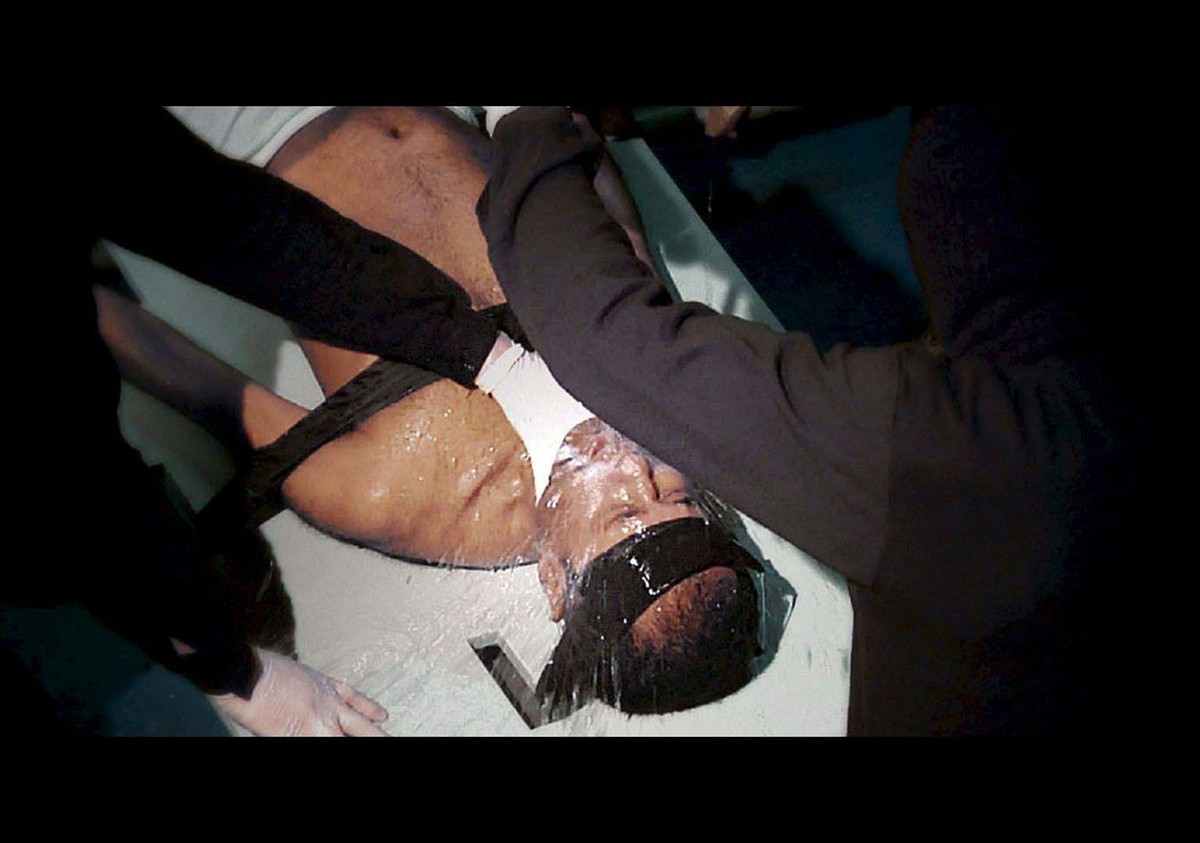 epa01323382 Still image taken from the Amnesty International film called "Stuff Of Life", a hard-hitting new film about "waterboarding", the practice of torturing prisoners by part ...